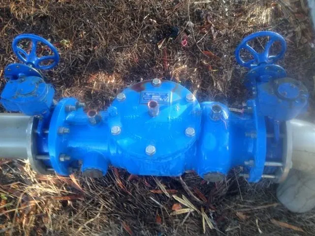 Blue backflow prevention device - Reef City Plumbing in Beecher, QLD