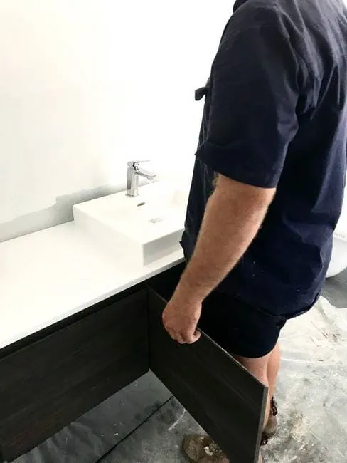 Plumber installing sink in Gladstone